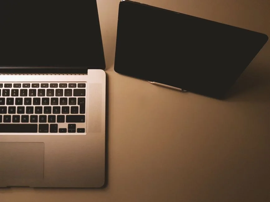 A focused designer works on a user-centric project in a modern office environment.